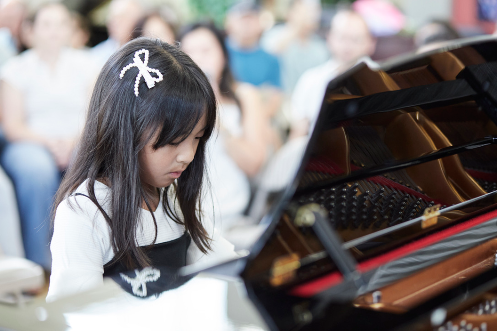 child playing piano